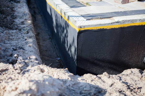 Professional Waterproofing technician working in Friendsville, TN